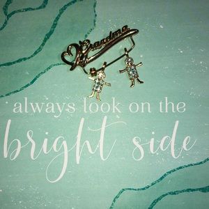 K.i.s grandma brooch with two boy March charms